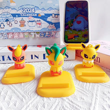 Lade das Bild in den Galerie-Viewer, Pikachu, Evoli, Evoli Entwicklungen Handyständer in vielen Motiven und Farben
